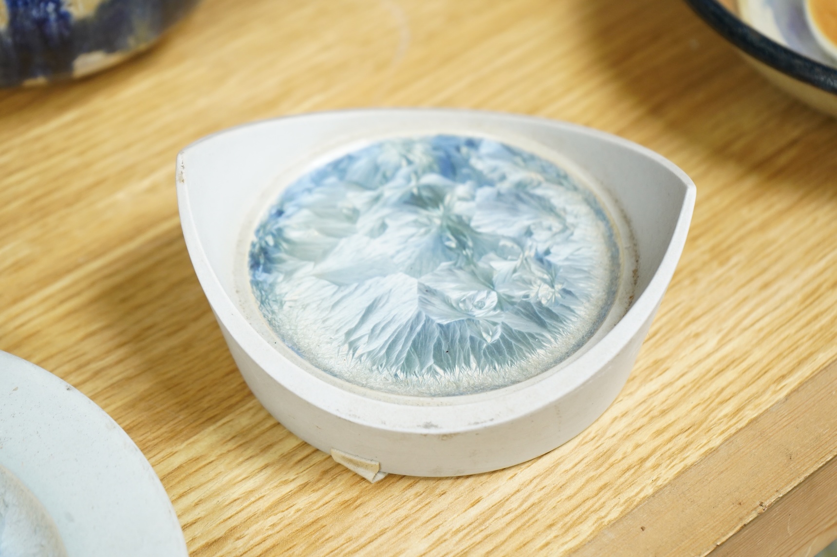 A collection of studio pottery to include crystalline glazed works by Stephen R Jones Des, Brighton, vases and a pair of dishes, largest 22cm high